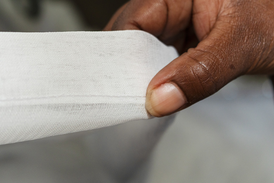Fabric being made